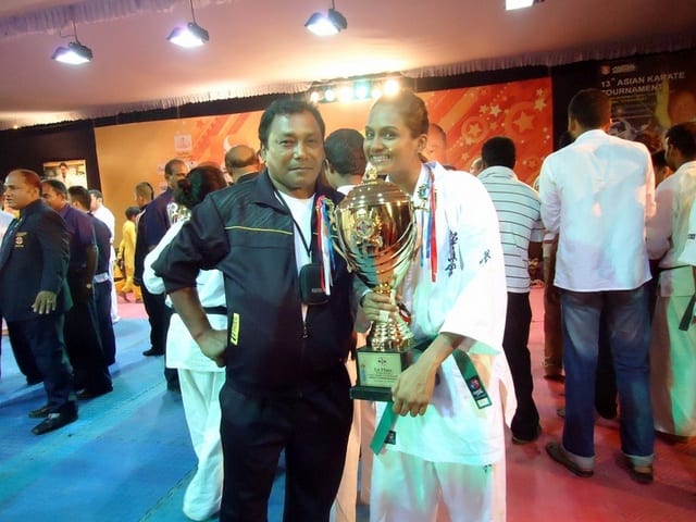 A team photograph taken at the 13th Asian Open Kyokushin Karate Tournament.