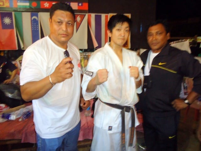 A team photograph taken at the 13th Asian Open Kyokushin Karate Tournament.
