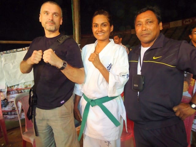A podium ceremony with the Nepali flag at the 13th Asian Open Kyokushin Karate Tournament.